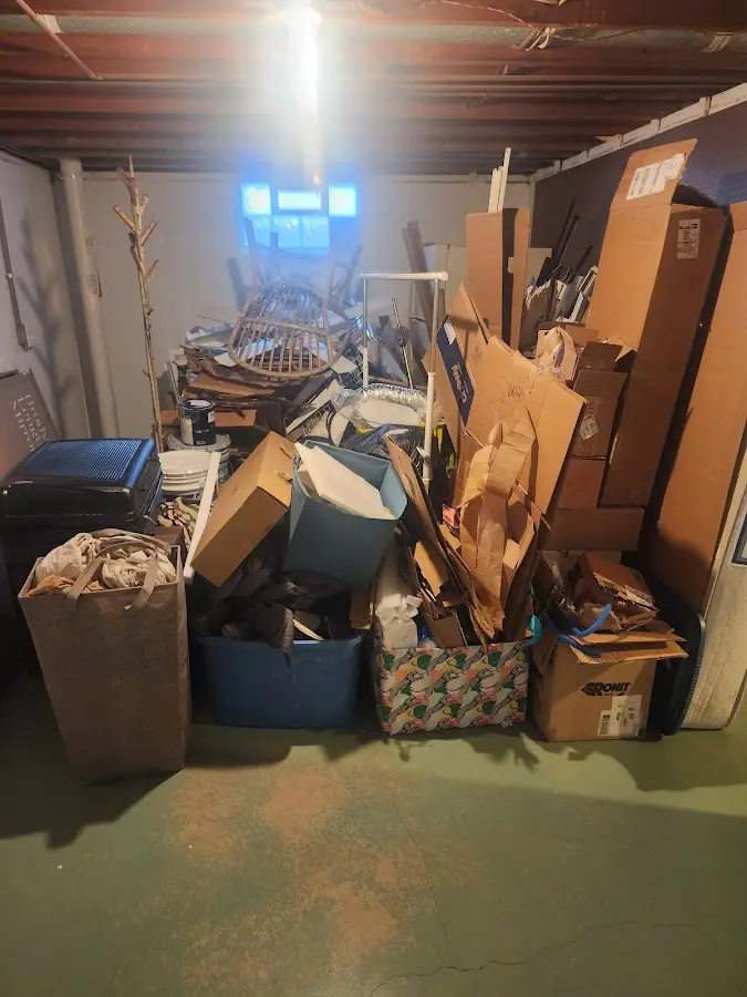 Roll-off dumpster container at job site for Yard Waste Dumpster Rental in Kearns